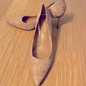 Cork heel with gold detail and gold and black detailed heel